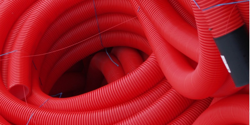rMIX: Production de Tubes Ondulés en PEHD pour la Protection des Câbles